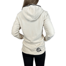 Person wearing a white textured fleece jacket with a logo on the back