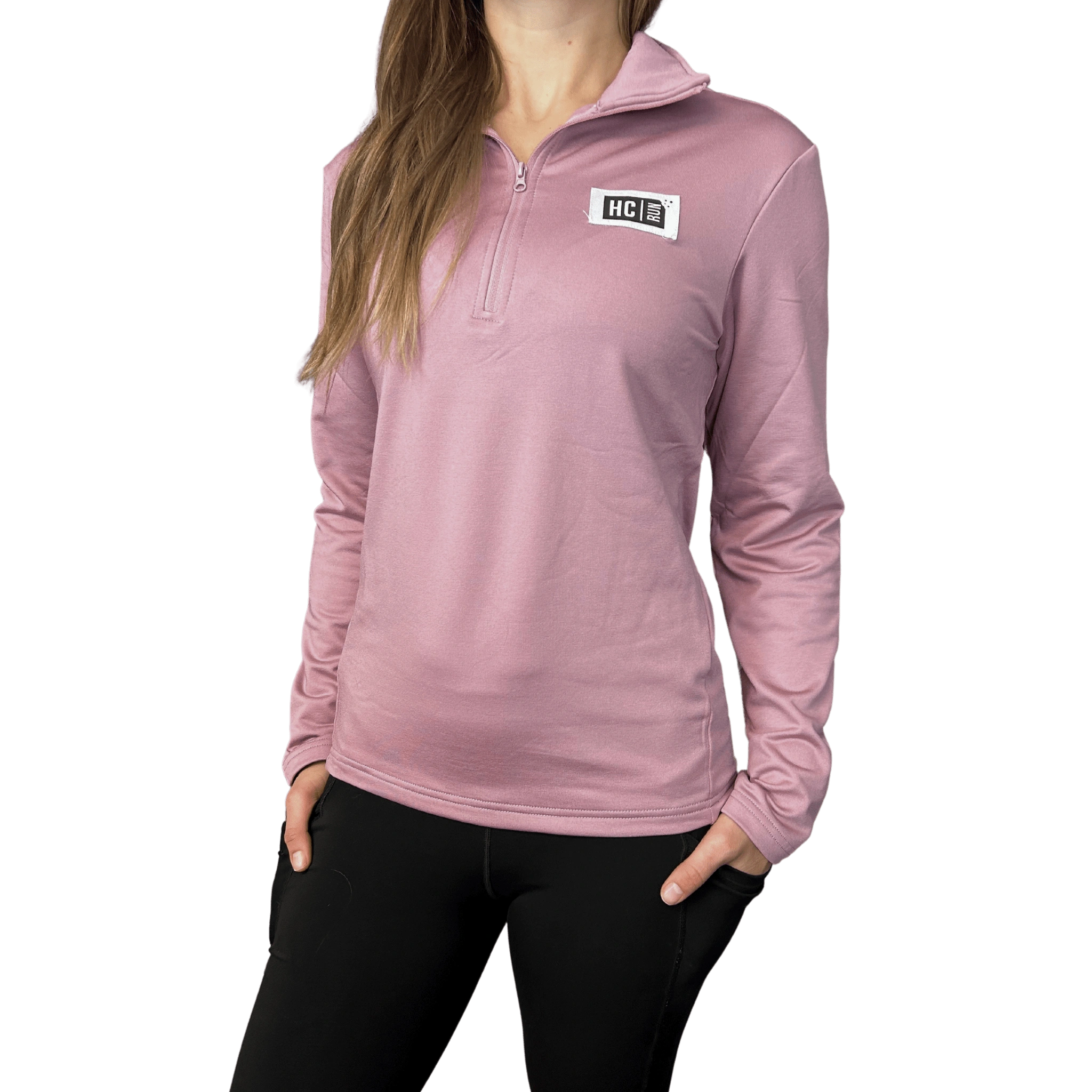 Person wearing a pink long-sleeve quarter zip with HC Run logo