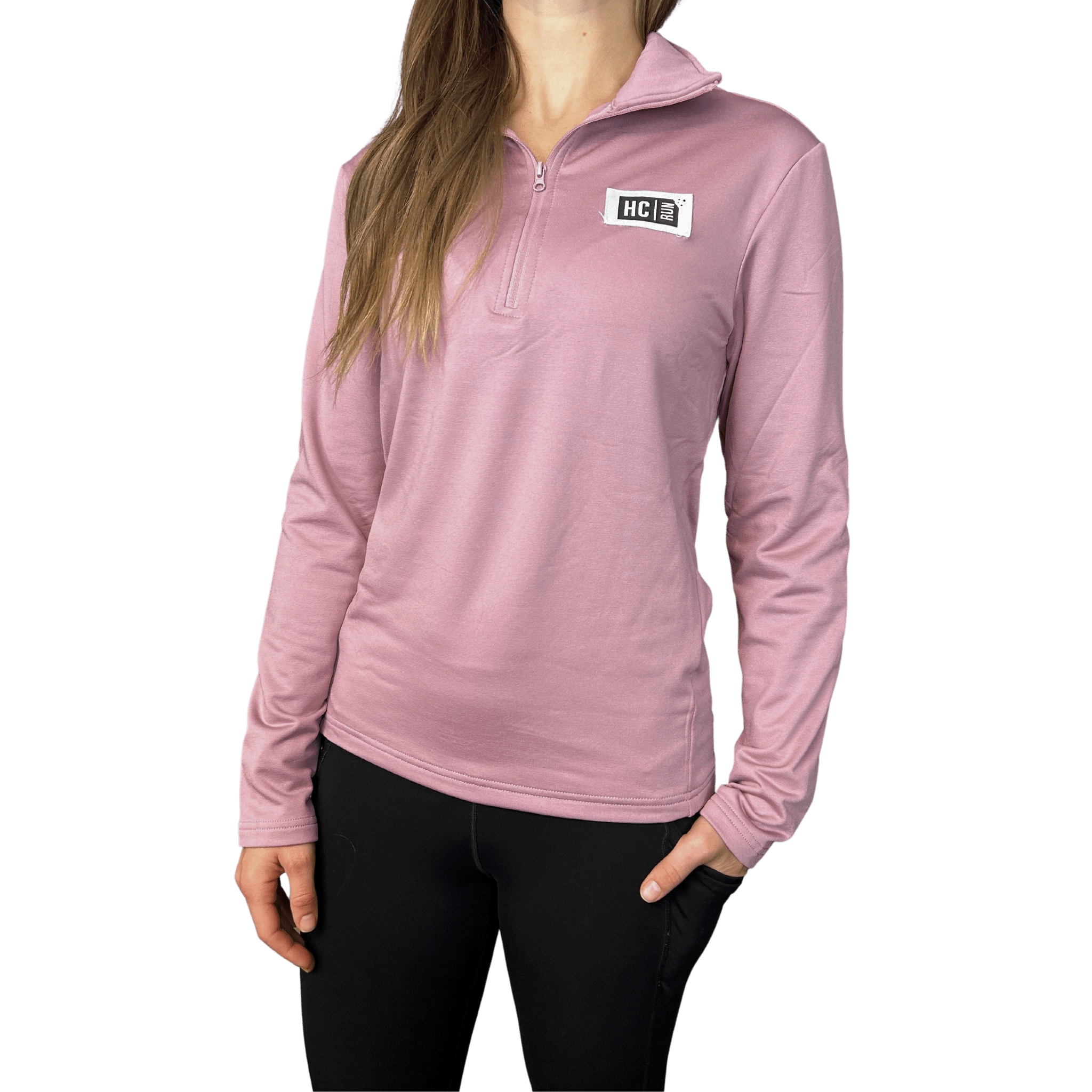 Person wearing a pink long-sleeve quarter zip with HC Run logo