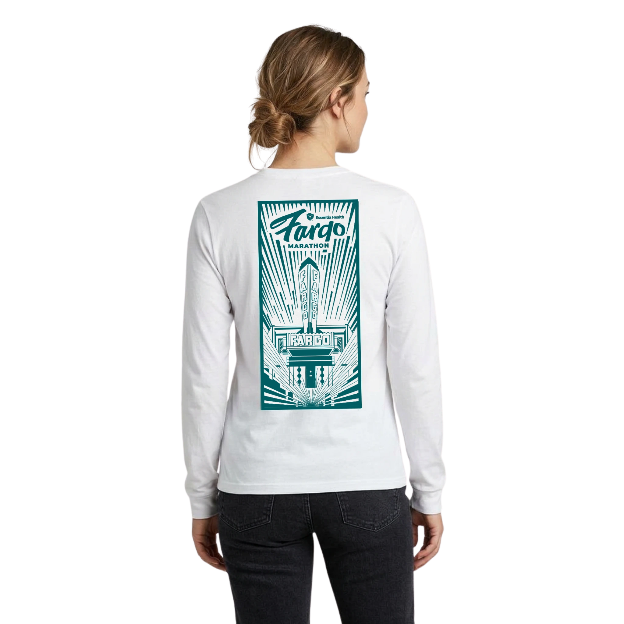 Woman wearing a white long-sleeve shirt with a green graphic of the Fargo Theatre on the back