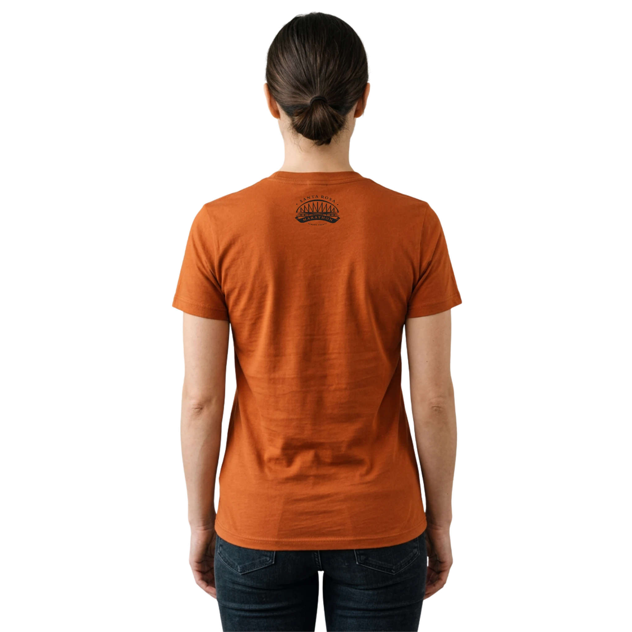 Woman wearing an orange t-shirt with a Santa Rosa Marathon logo on the back