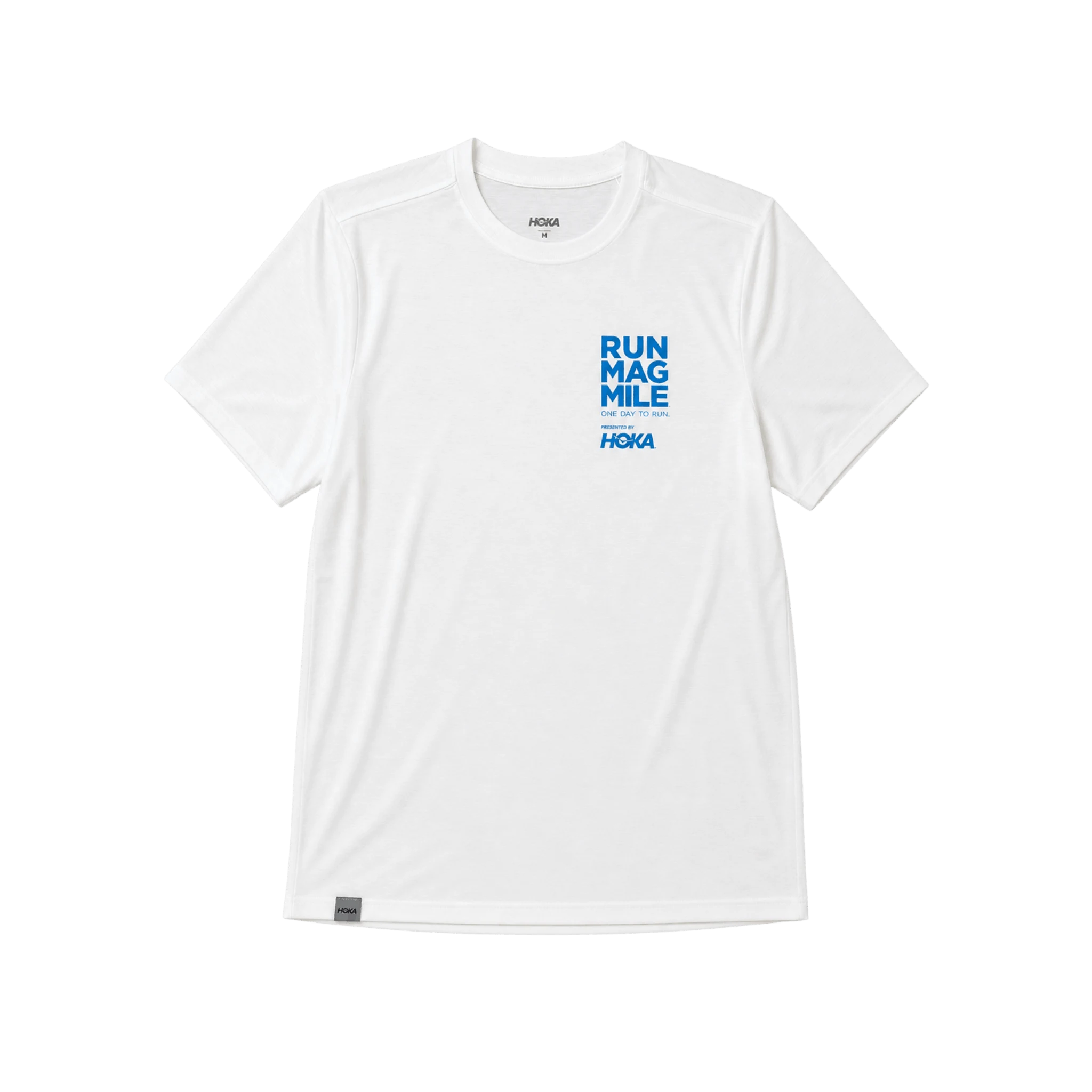 A white short-sleeve t-shirt with blue text on the left chest reading 'RUN MAG MILE' and 'HOKA'