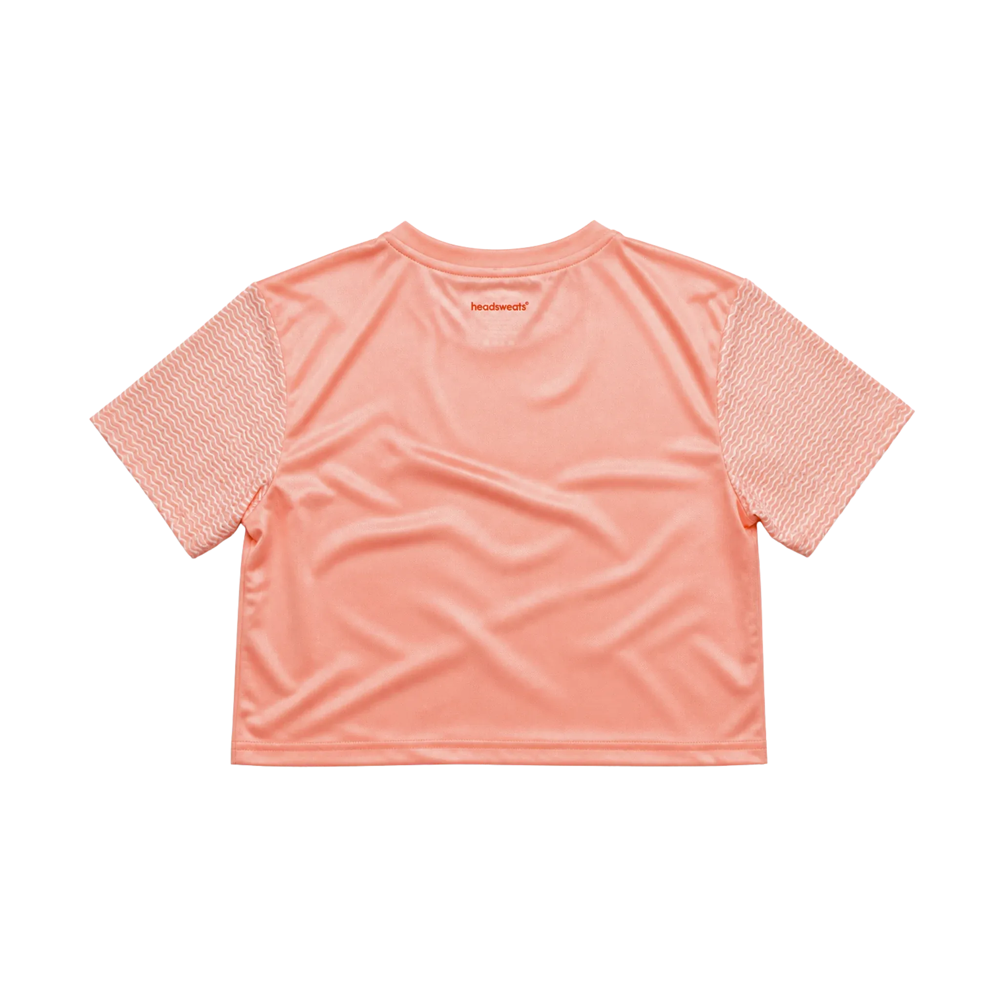 Back of a peach crop top with pattern sleeves
