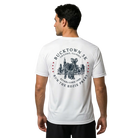 Man wearing a white t-shirt with a Bucktown 5K graphic design on the back 