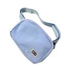 Light blue belt bag with strap and HC Run logo in left corner 
