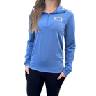 Person wearing a blue long-sleeve quarter zip with HC Run logo