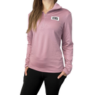 Person wearing a pink long-sleeve quarter zip with HC Run logo