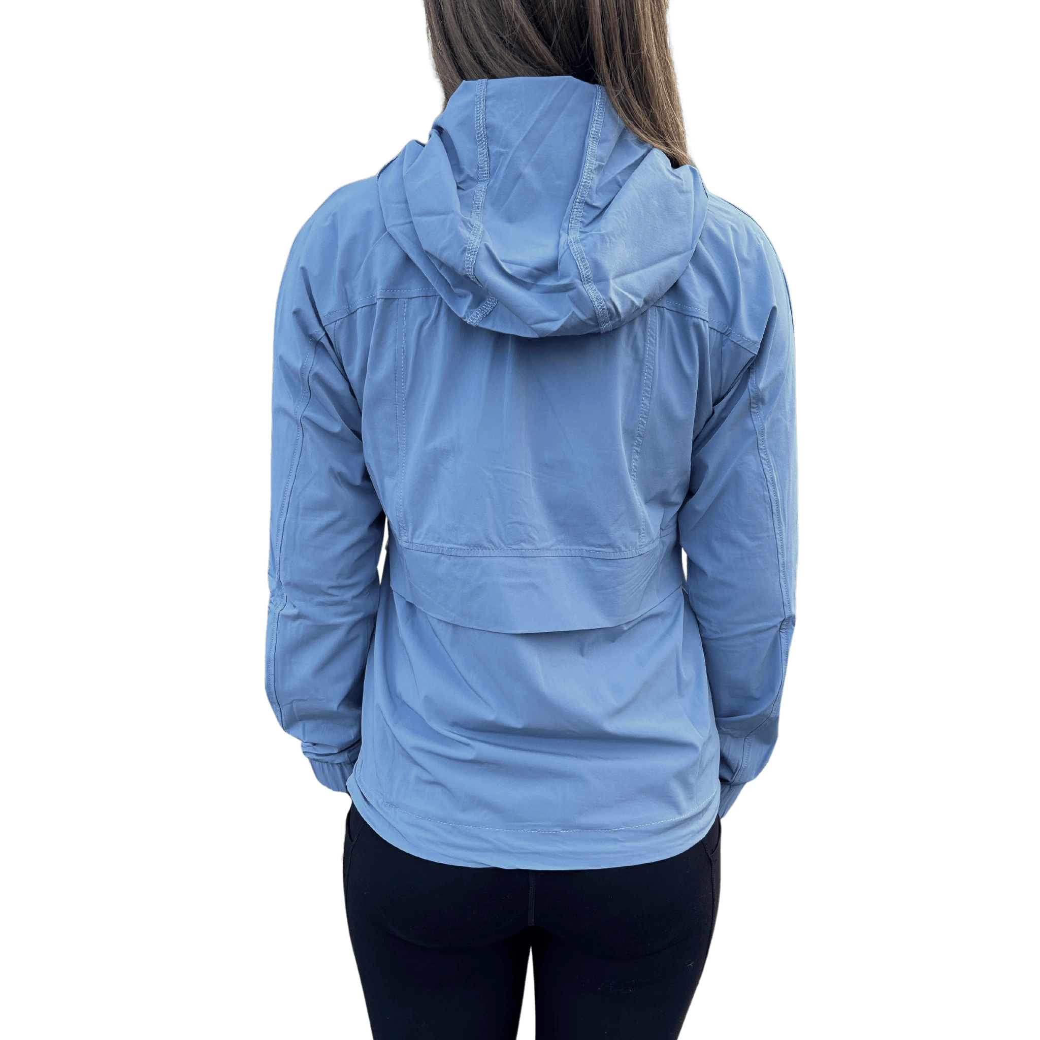 Backside of person wearing a light blue jacket