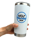 White tumbler with 'Hot Chocolate Run' logo held by a hand