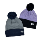 Cool blue and lavender beanies with pom-poms