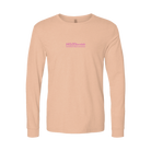 Peach long-sleeve shirt with pink Hot Chocolate Run logo on center chest