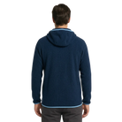 The back of a man wearing a navy blue fleece textured hoodie