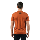 Man wearing an orange t-shirt with a Santa Rosa Marathon logo on the back