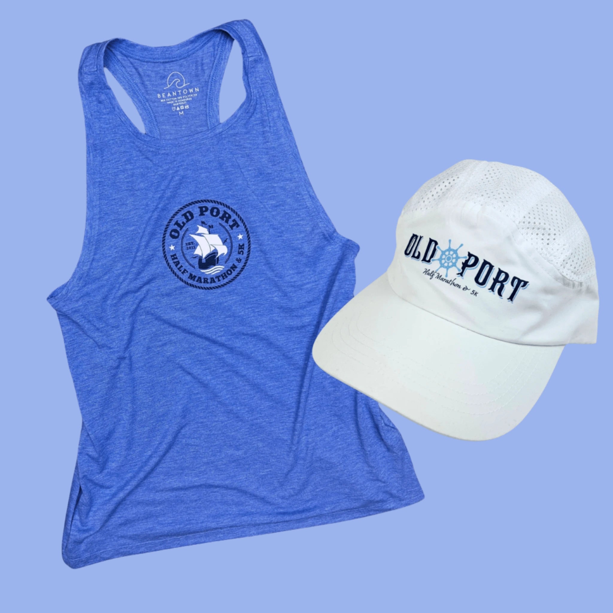 Blue tank top and white cap with 'Old Port' branding