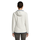 The back of a woman wearing a white fleece textured hoodie