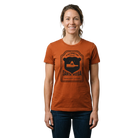 Woman wearing a rust-colored t-shirt with a black Santa Rosa Marathon 5K graphic and text on front 