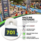 Race bib fasteners with a running event background