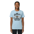 Person wearing a light blue t-shirt with a graphic design of Hot Chocolate Run characters and text