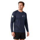 Man wearing a navy long-sleeve shirt with Milwaukee Marathon logo
