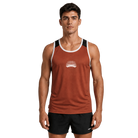 A man modeling a rust-orange athletic tank top with white and navy blue trim, featuring a white Santa Rosa Marathon logo on the chest