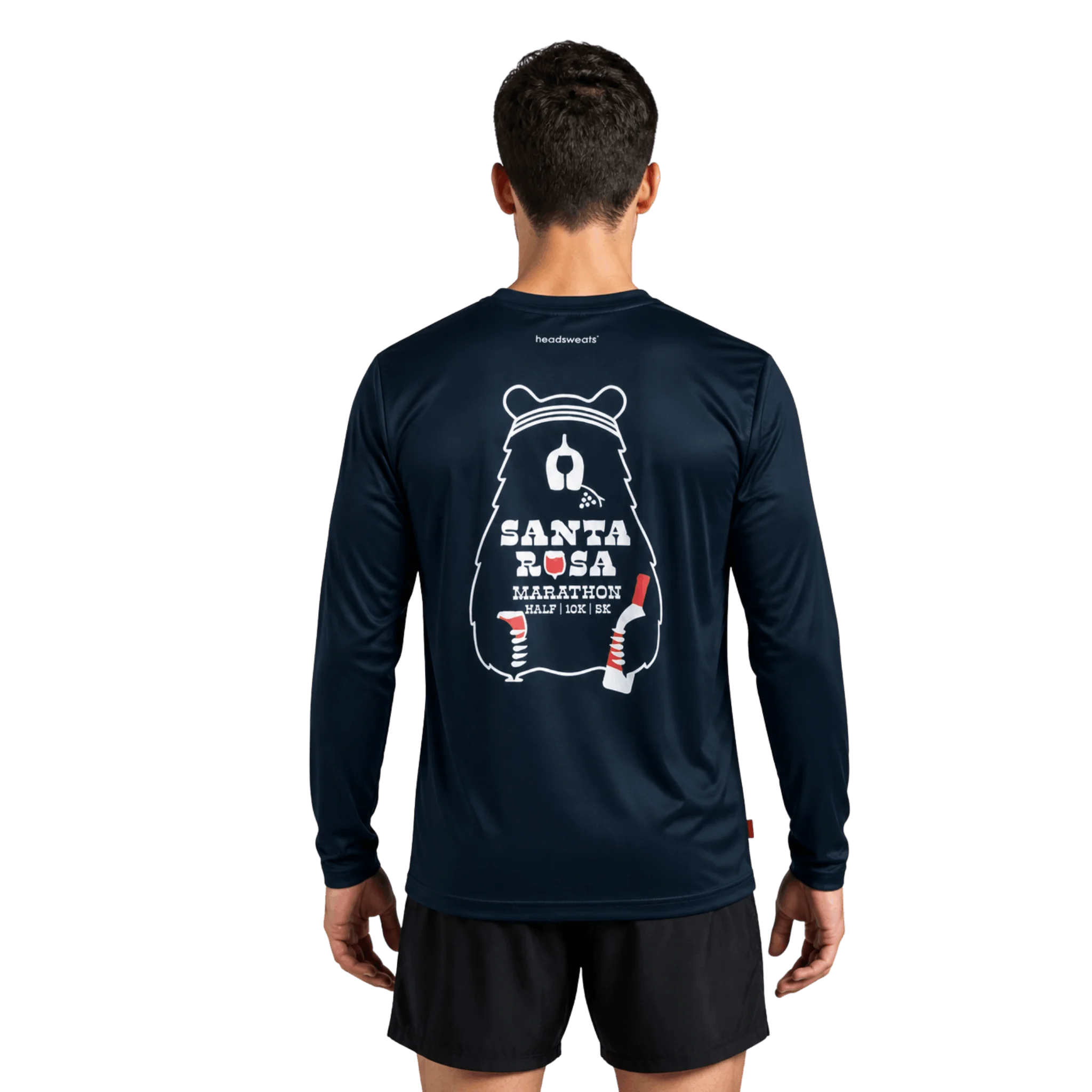 A man viewed from the back wearing a dark navy long-sleeve athletic shirt with a white Santa Rosa Marathon graphic on the back