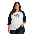 Woman wearing a white and navy baseball shirt with 'Soldier Field 10' text