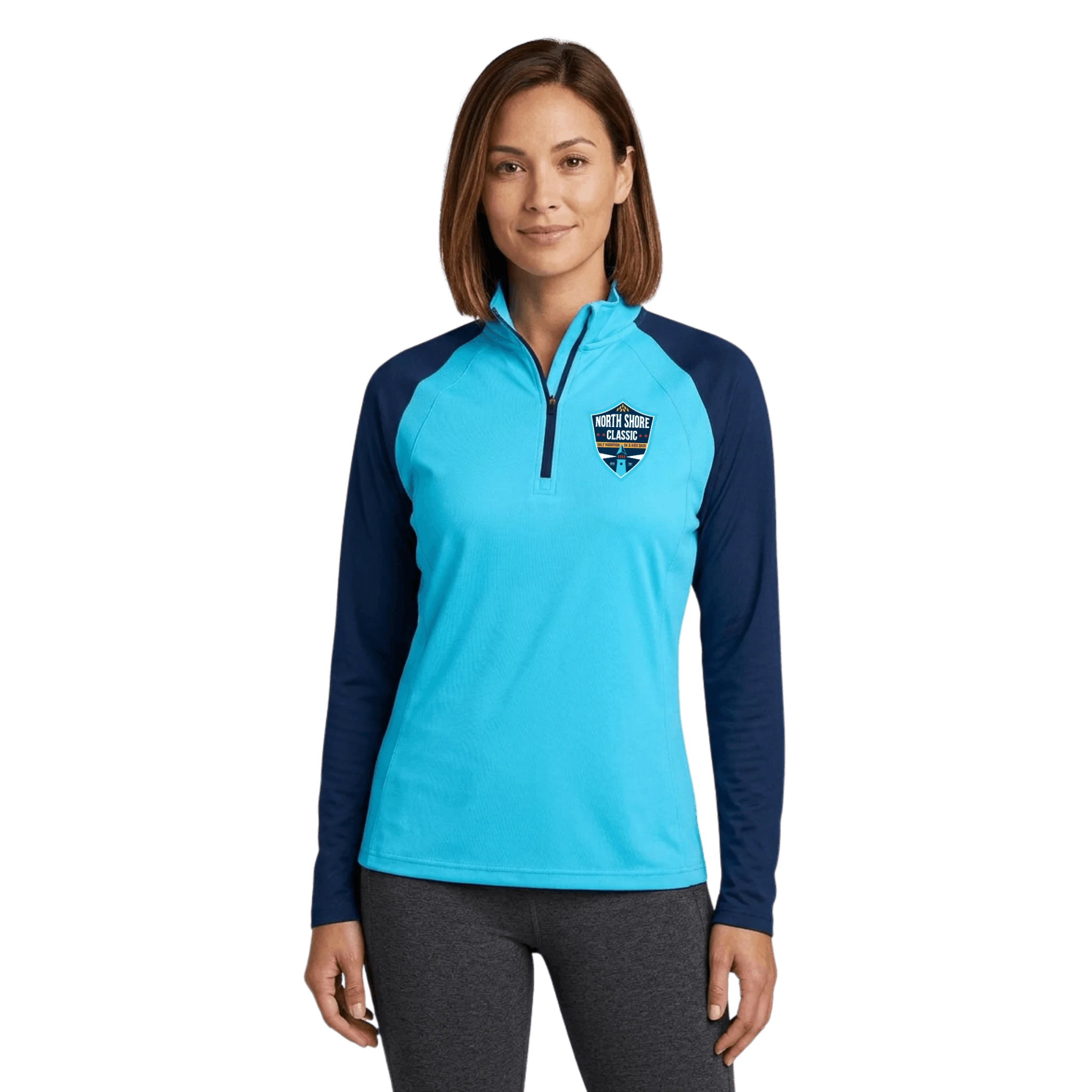 Woman wearing a light blue quarter zip with North Shore Classic logo