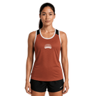 A woman modeling a rust-orange athletic tank top with white and navy blue trim, featuring a white Santa Rosa Marathon logo on the chest
